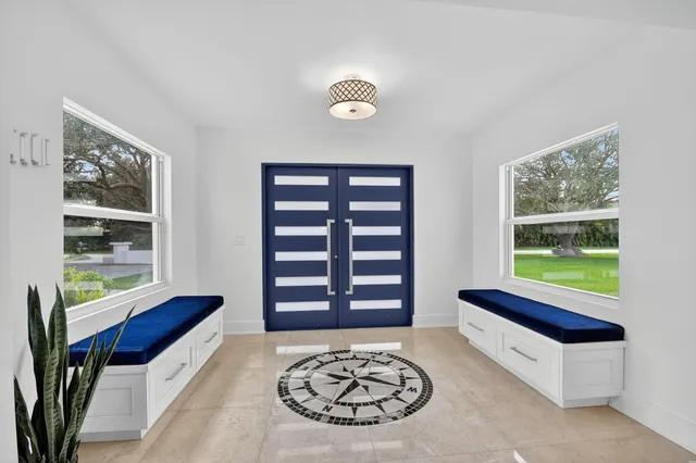 a view of an empty room and window