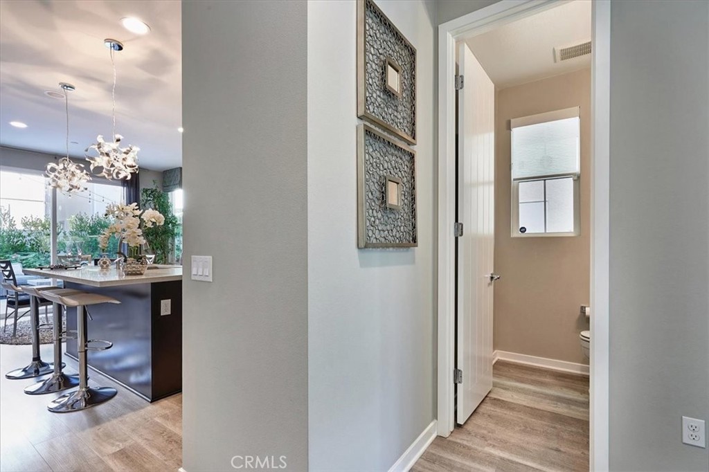 944 Sunlit Lane Costa Mesa, CA 92626 - Photo 21 of 71 a view of a hallway and dining room