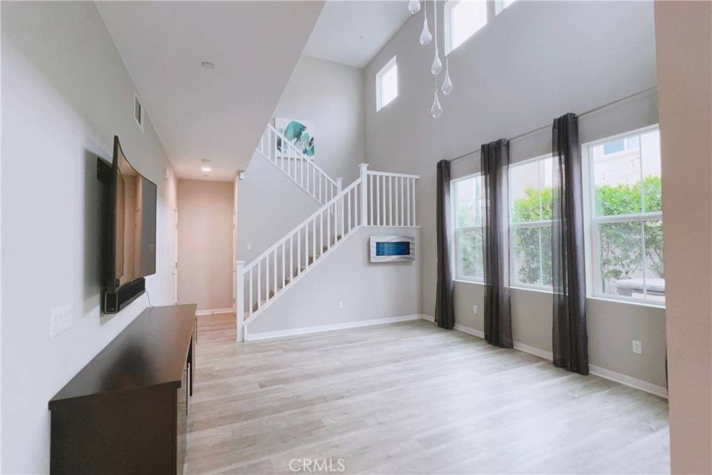 944 Sunlit Lane Costa Mesa, CA 92626 - Photo 22 of 71 a view of an entryway with wooden floor