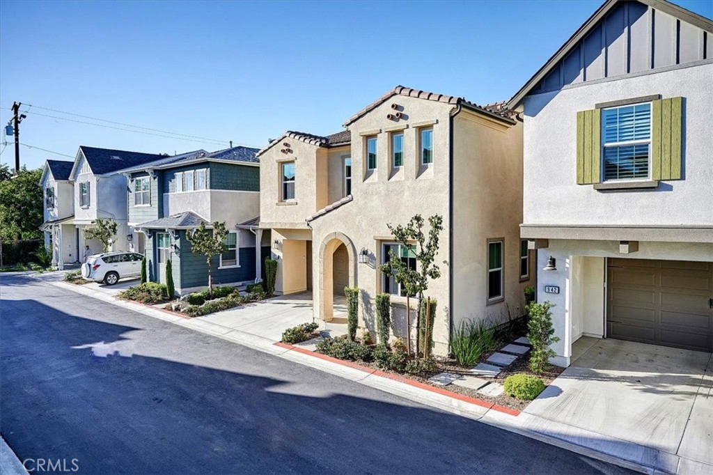 944 Sunlit Lane Costa Mesa, CA 92626 - Photo 3 of 71 a front view of a house with porch