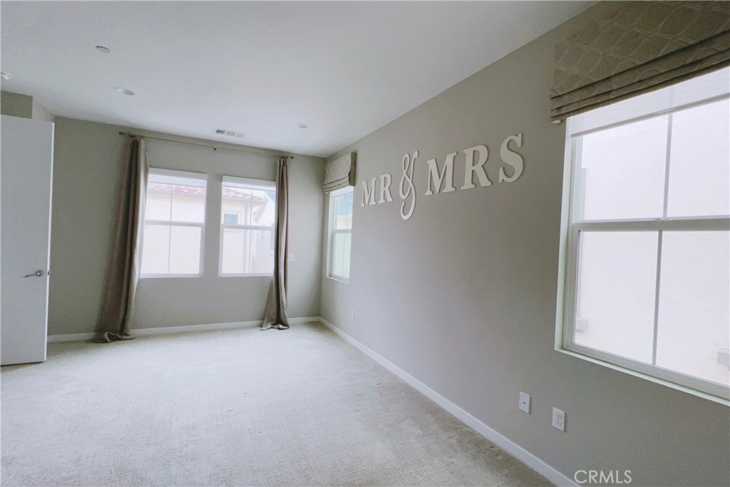 944 Sunlit Lane Costa Mesa, CA 92626 - Photo 32 of 71 a view of an empty room with a window