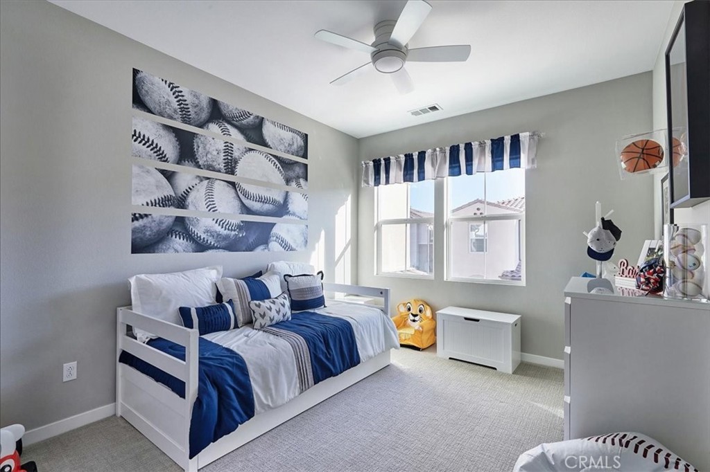 944 Sunlit Lane Costa Mesa, CA 92626 - Photo 48 of 71 a bedroom with a bed furniture and a window