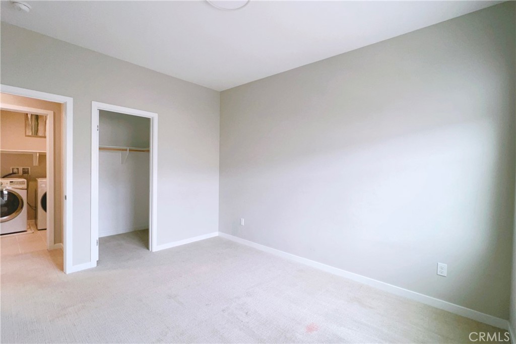 944 Sunlit Lane Costa Mesa, CA 92626 - Photo 50 of 71 an empty room with closet