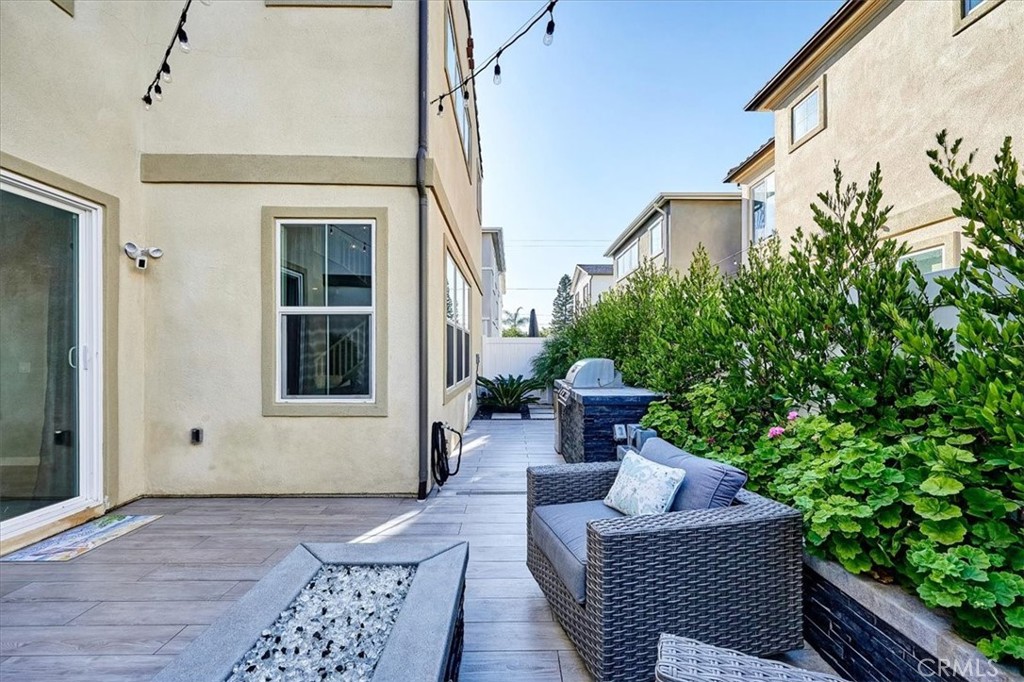944 Sunlit Lane Costa Mesa, CA 92626 - Photo 58 of 71 a view of a porch with furniture