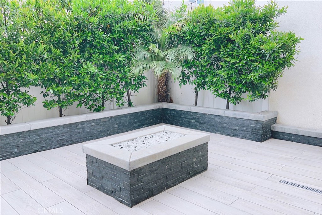 944 Sunlit Lane Costa Mesa, CA 92626 - Photo 63 of 71 a view of a bench in a backyard