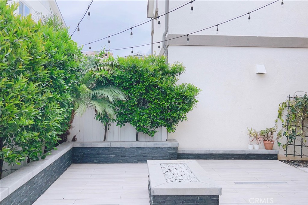 944 Sunlit Lane Costa Mesa, CA 92626 - Photo 64 of 71 a view of a street with potted plants