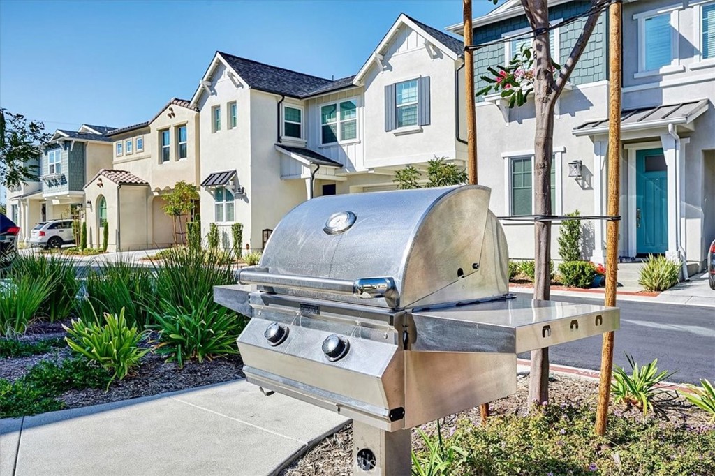 944 Sunlit Lane Costa Mesa, CA 92626 - Photo 68 of 71 front view of a house with a garden