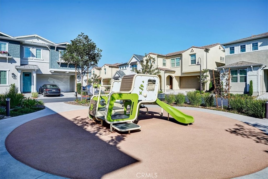944 Sunlit Lane Costa Mesa, CA 92626 - Photo 70 of 71 a view of a house with sitting area and garden