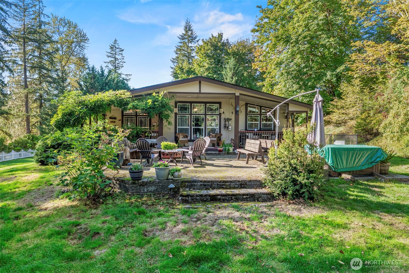 5416 Rose Valley Road Kelso, WA 98626 - Photo 7 of 28 a view of a chair and table in the garden