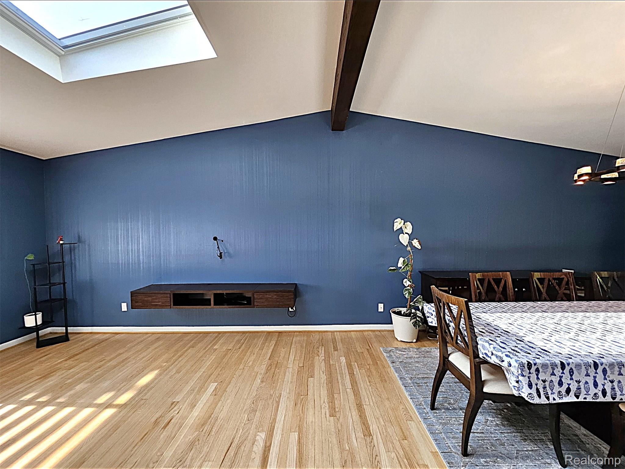 7120 Pebblecreek Road West Bloomfield, MI 48322 - Photo 13 of 31 Vaulted ceilings featuring an integrated skylight and exposed wood beam