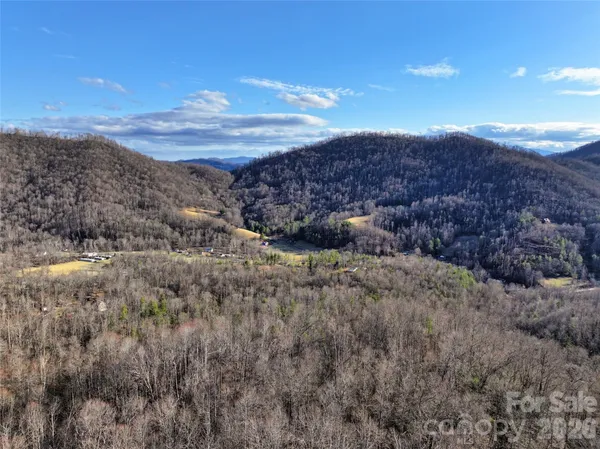 a view of mountains and valleys