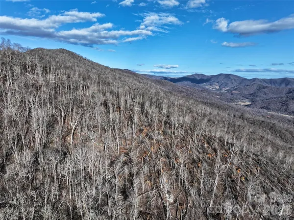 a view of mountains and valleys