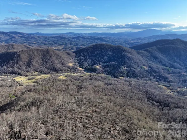 a view of mountains and valleys