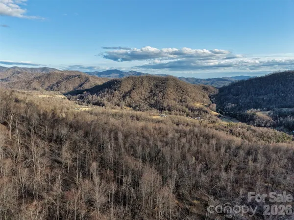 a view of mountains and valleys