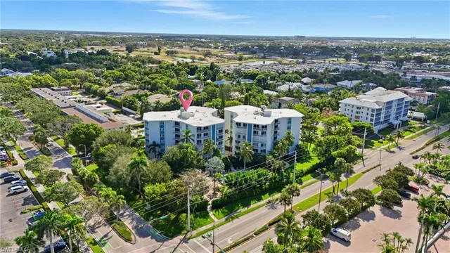 an aerial view of a city with lots of residential buildings