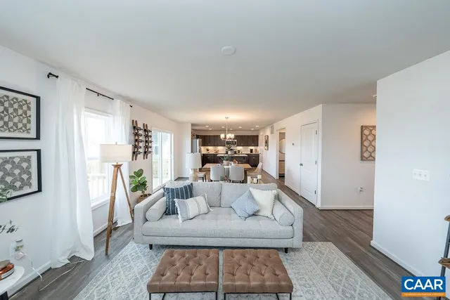 a living room with furniture and a couch
