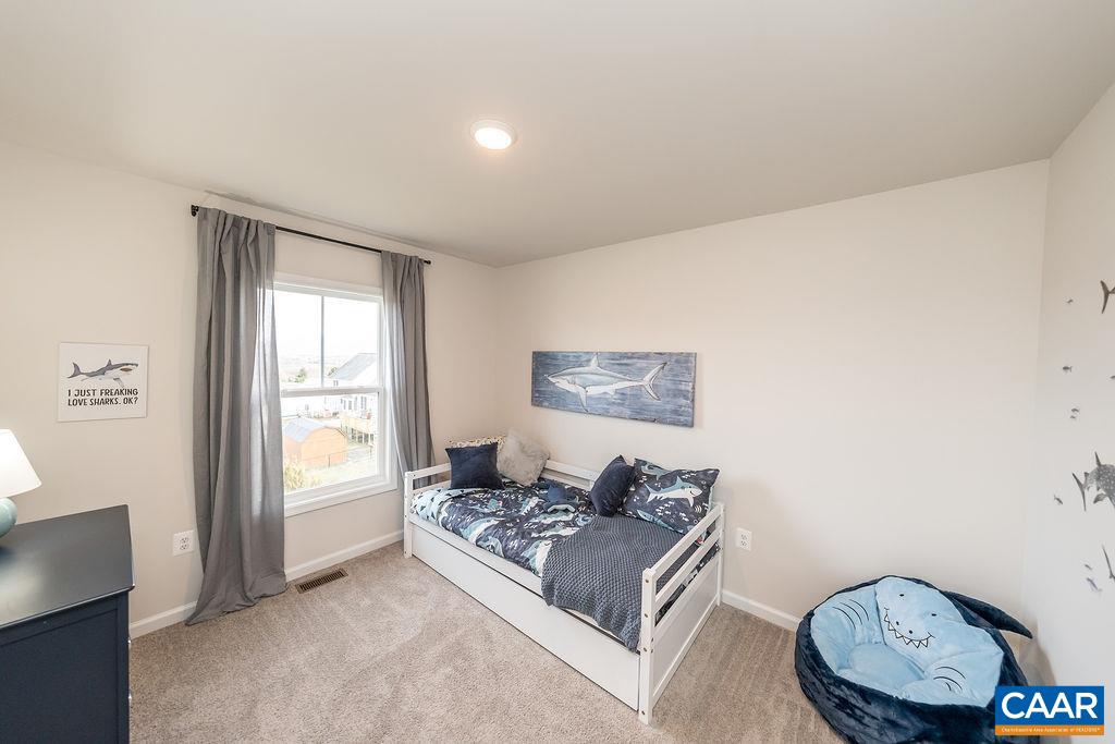 86 Lookover Terrace Stuarts Draft, VA 24477 - Photo 27 of 31 a living room with furniture a window and a wooden floor