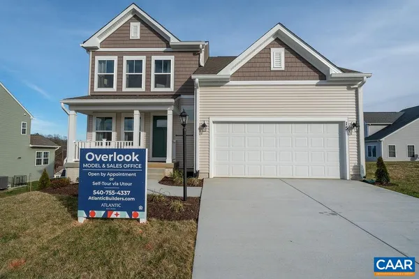 front view of a house with a small yard