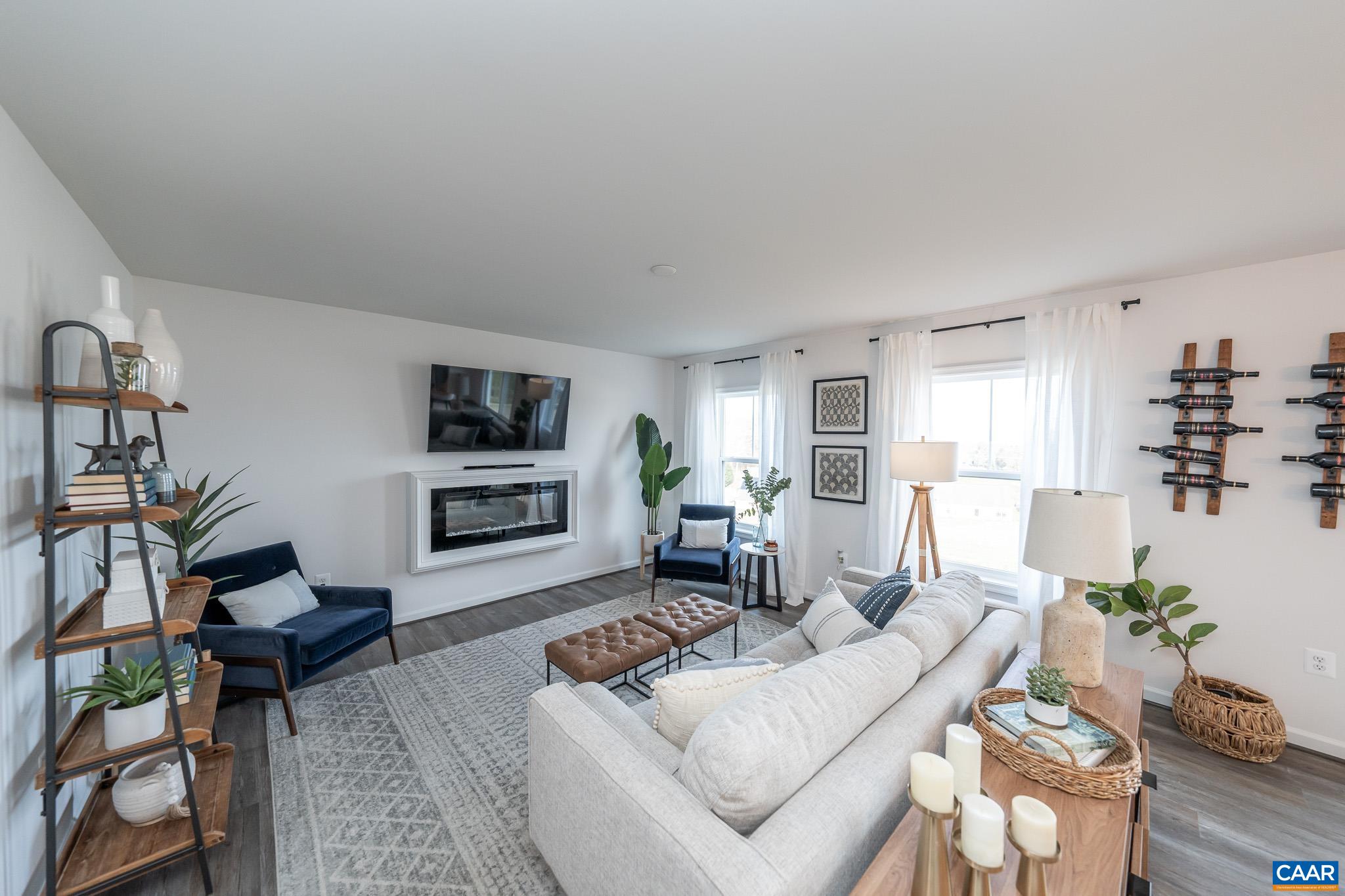 86 Lookover Terrace Stuarts Draft, VA 24477 - Photo 8 of 31 a living room with furniture a flat screen tv and a fireplace