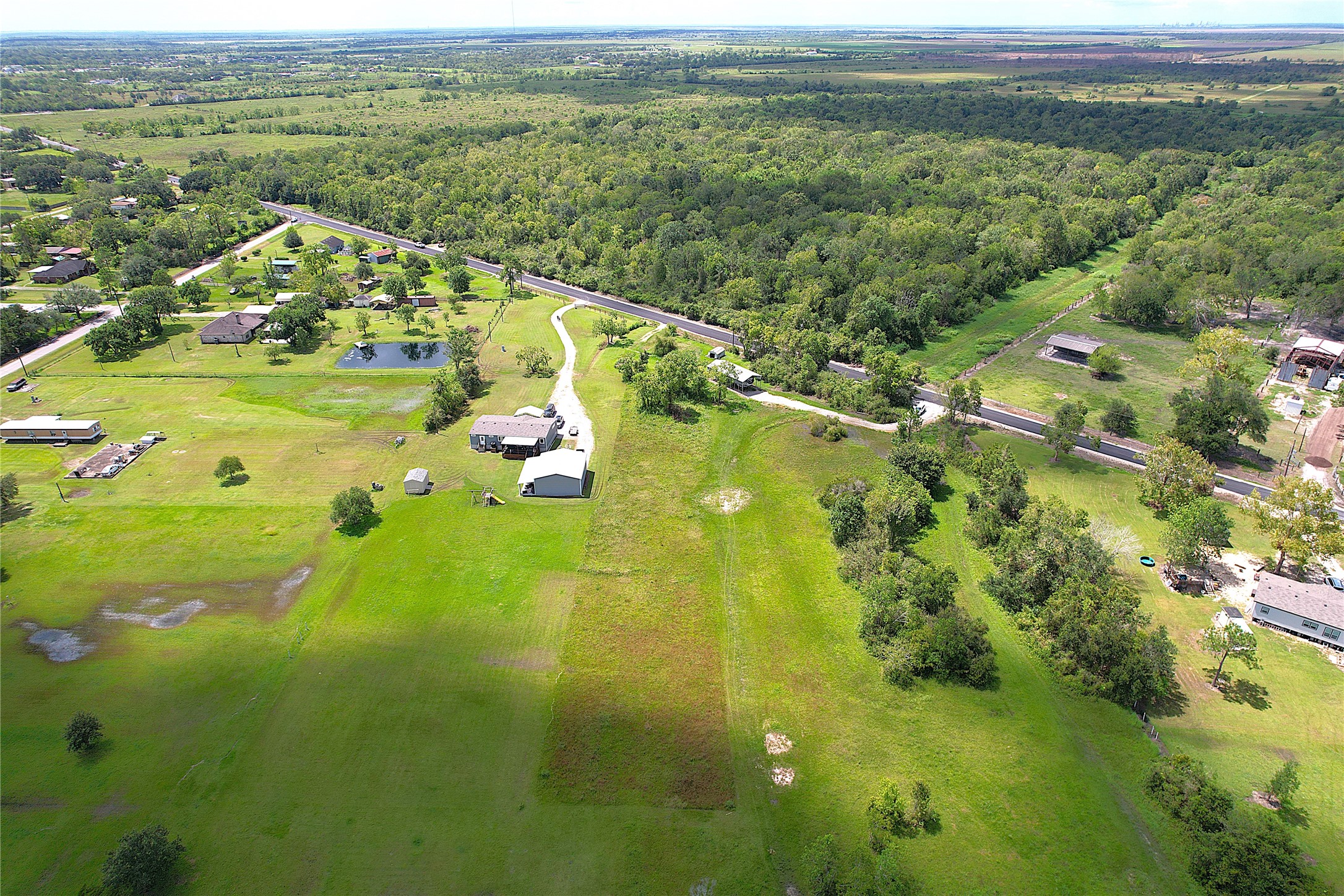 6607 Highland Road Santa Fe, TX 77517 - Photo 5 of 11 a view of a lake with a mountain
