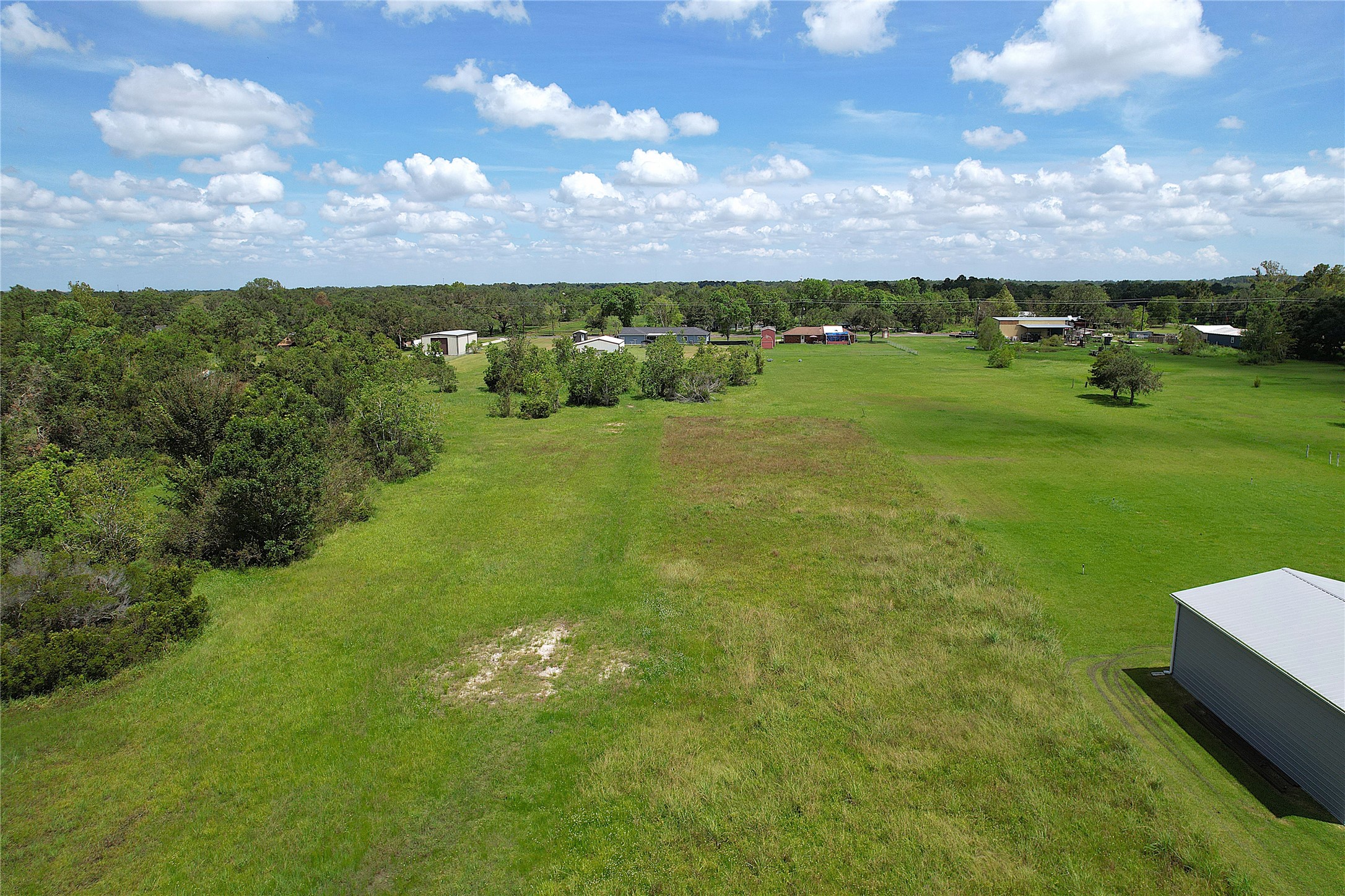 6607 Highland Road Santa Fe, TX 77517 - Photo 9 of 11 a view of a lake with a houses