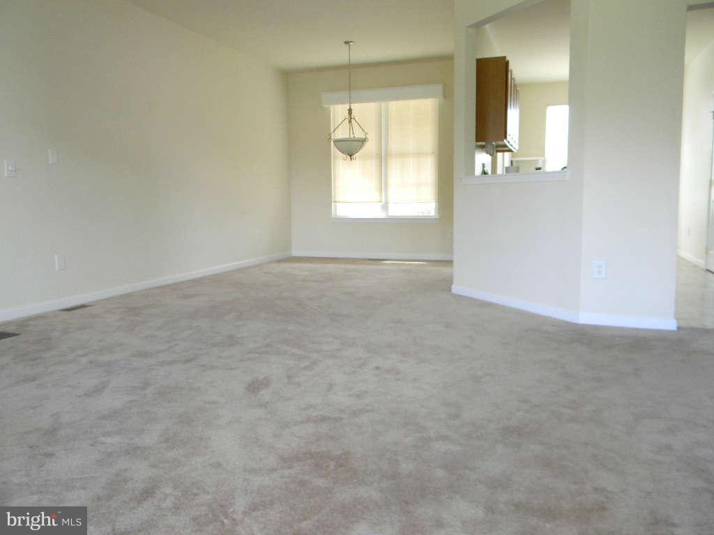 115 Lair Way Inwood, WV 25428 - Photo 14 of 28 an empty room that has a window