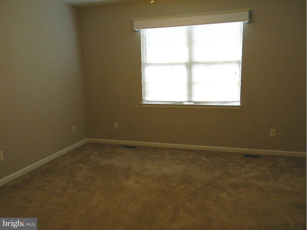 115 Lair Way Inwood, WV 25428 - Photo 24 of 28 an empty room with a window