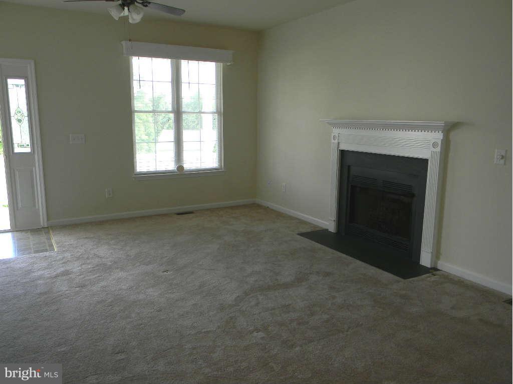115 Lair Way Inwood, WV 25428 - Photo 25 of 28 an empty room with windows