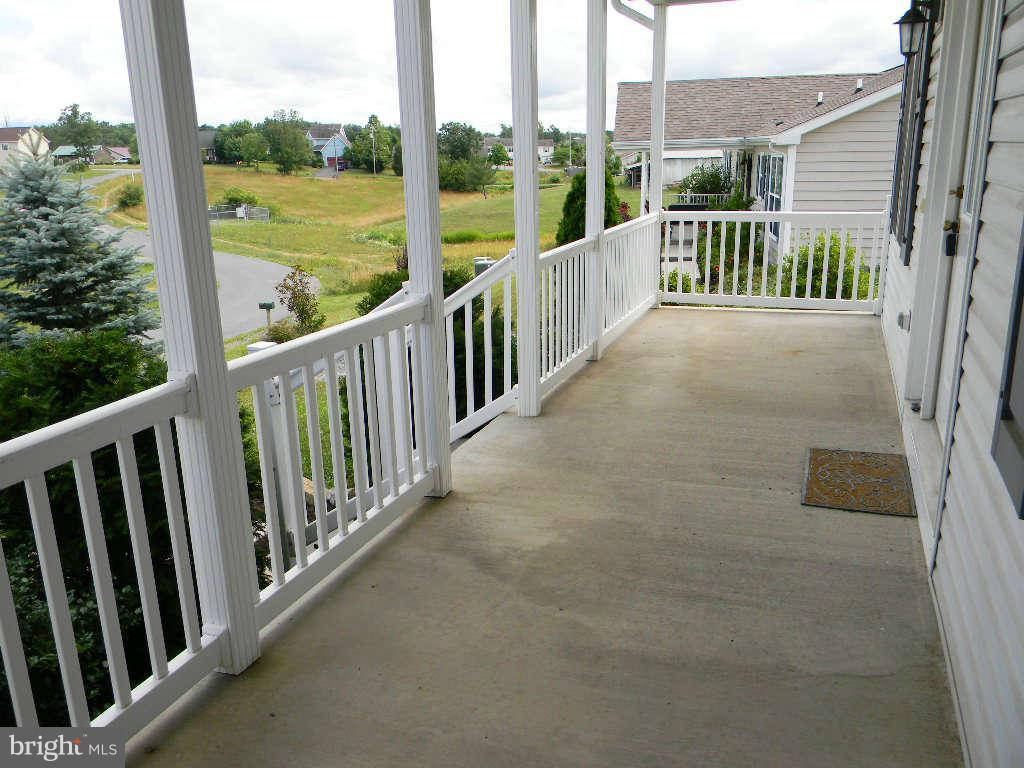 115 Lair Way Inwood, WV 25428 - Photo 4 of 28 a view of a city from a balcony