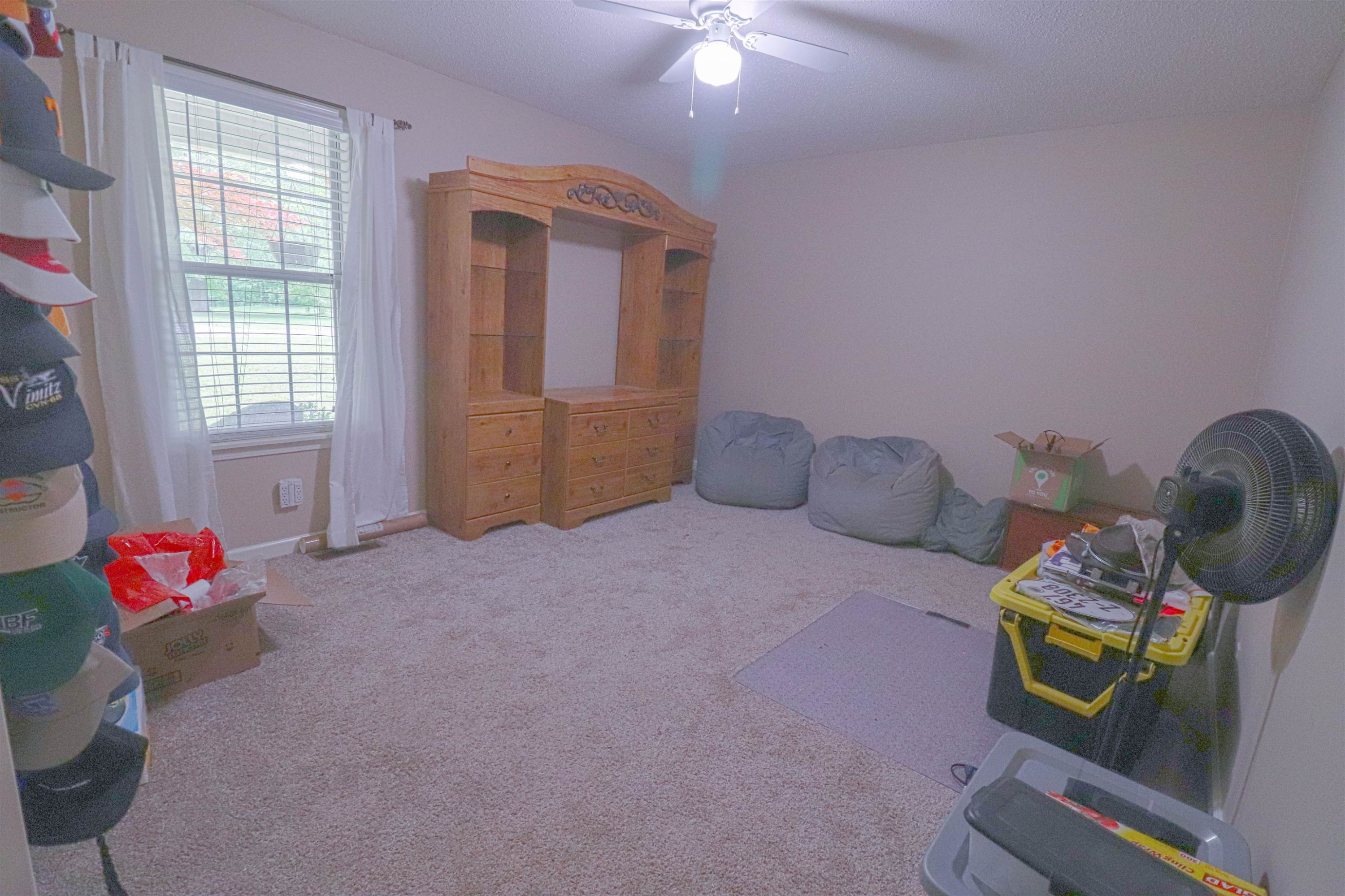 4934 Asbury Glimp Road Ripley, TN 38063 - Photo 13 of 25 a living room with furniture