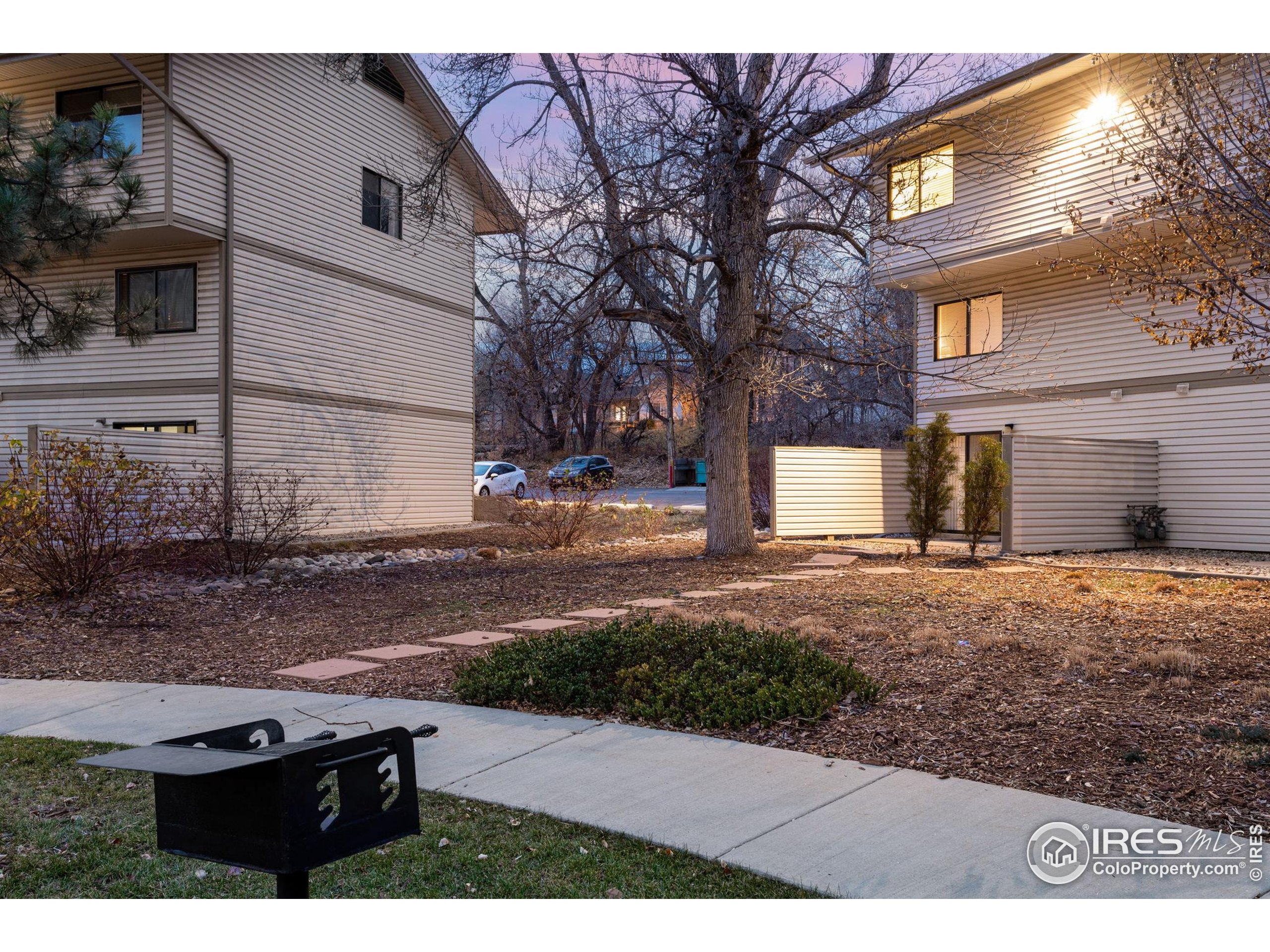 1705 Heatheridge Road Fort Collins, CO 80526 - Photo 6 of 21 a view of a street with a house on its side