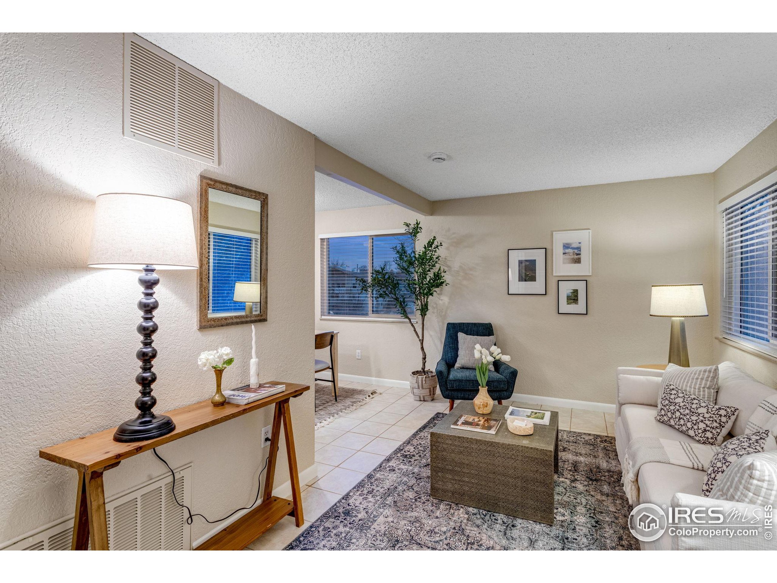 1705 Heatheridge Road Fort Collins, CO 80526 - Photo 9 of 21 a living room with furniture