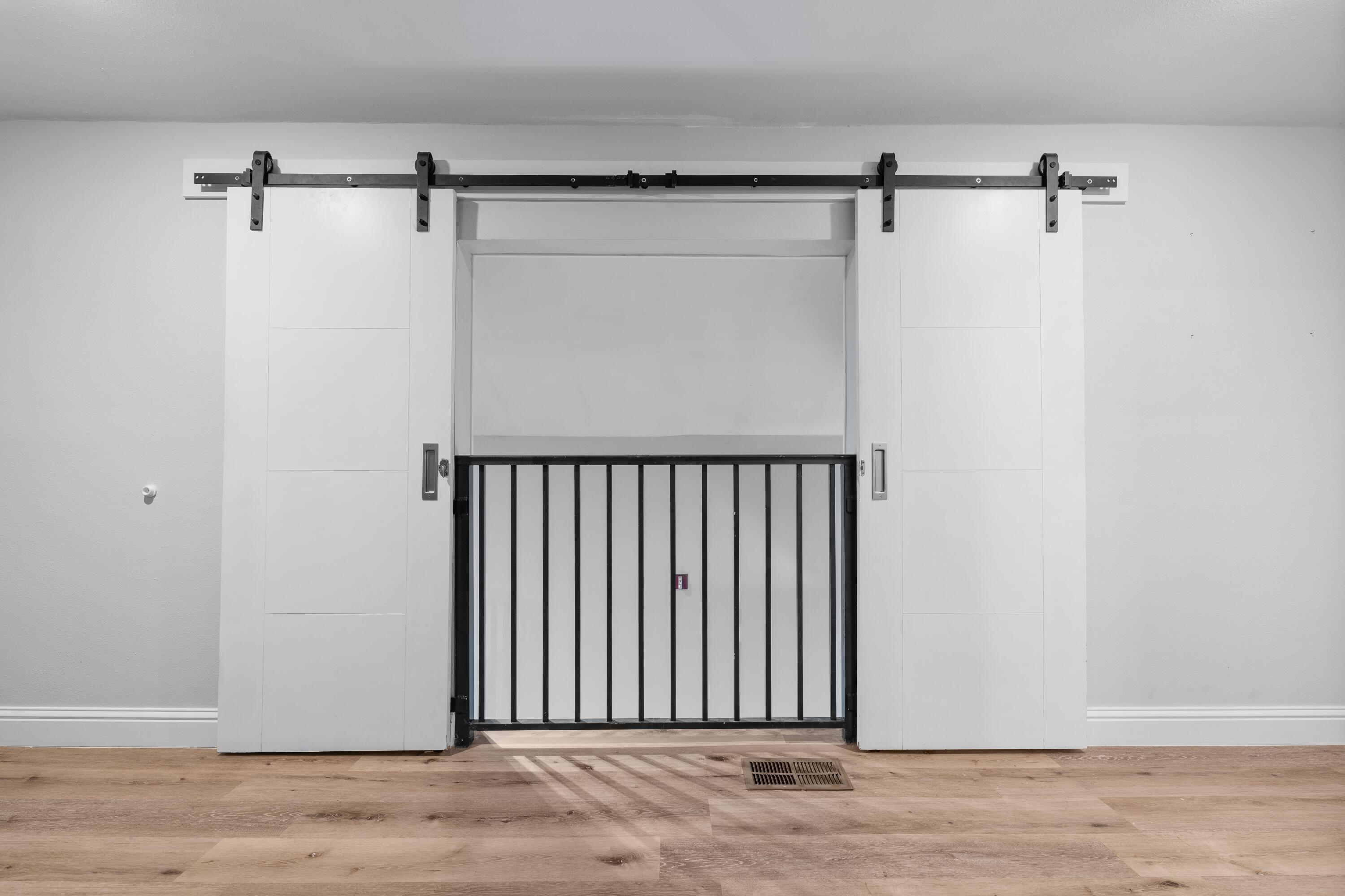 4507 Furling Lane, Unit 302 Destin, FL 32541 - Photo 39 of 49 a view of a room with racks on the wall