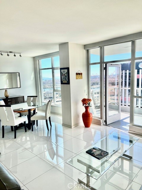 400 West Ocean Boulevard, Unit 2004 Long Beach, CA 90802 - Photo 11 of 47 a living room filled with furniture and a table