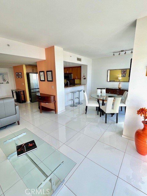 400 West Ocean Boulevard, Unit 2004 Long Beach, CA 90802 - Photo 14 of 47 a living room with furniture and a flat screen tv