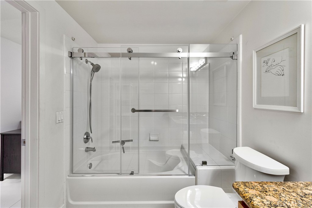 400 West Ocean Boulevard, Unit 2004 Long Beach, CA 90802 - Photo 22 of 47 a bathroom with a toilet and a shower