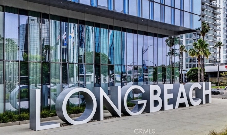 400 West Ocean Boulevard, Unit 2004 Long Beach, CA 90802 - Photo 3 of 47 a view of a deck with a table and chairs