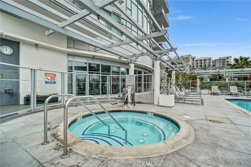 400 West Ocean Boulevard, Unit 2004 Long Beach, CA 90802 - Photo 36 of 47 a view of a swimming pool with outdoor seating