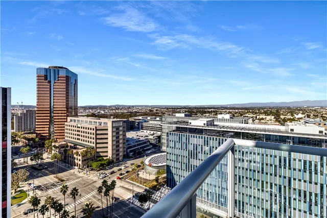 a view of a balcony with city view