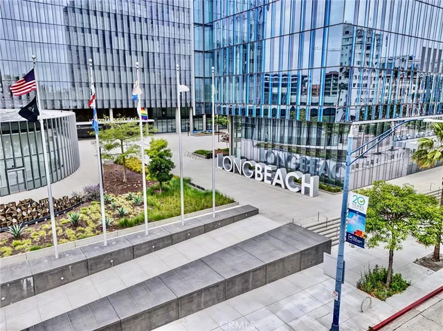 a view of an chairs and tables in the back yard of the house