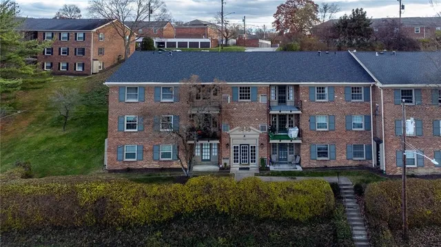 a aerial view of a house with a garden