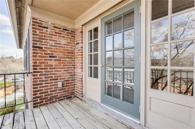 a view of front door and deck of the house