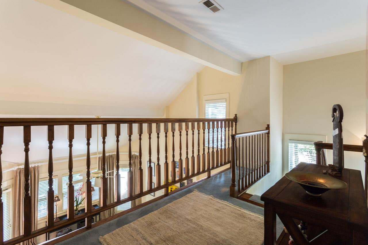 1723 Falls Church Road Raleigh, NC 27609 - Photo 18 of 25 Has high rail and looks over the vaulted living room Upstairs Balcony