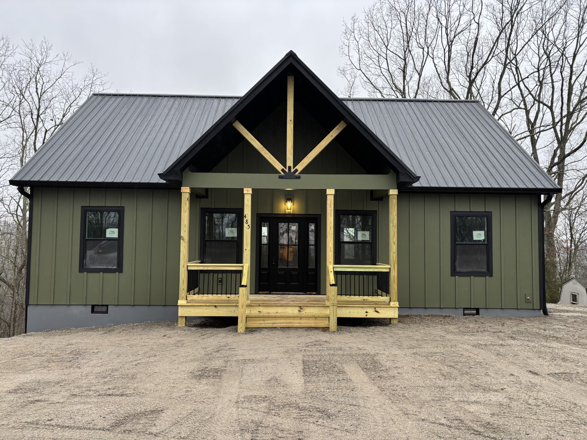 an entrance to house with yard