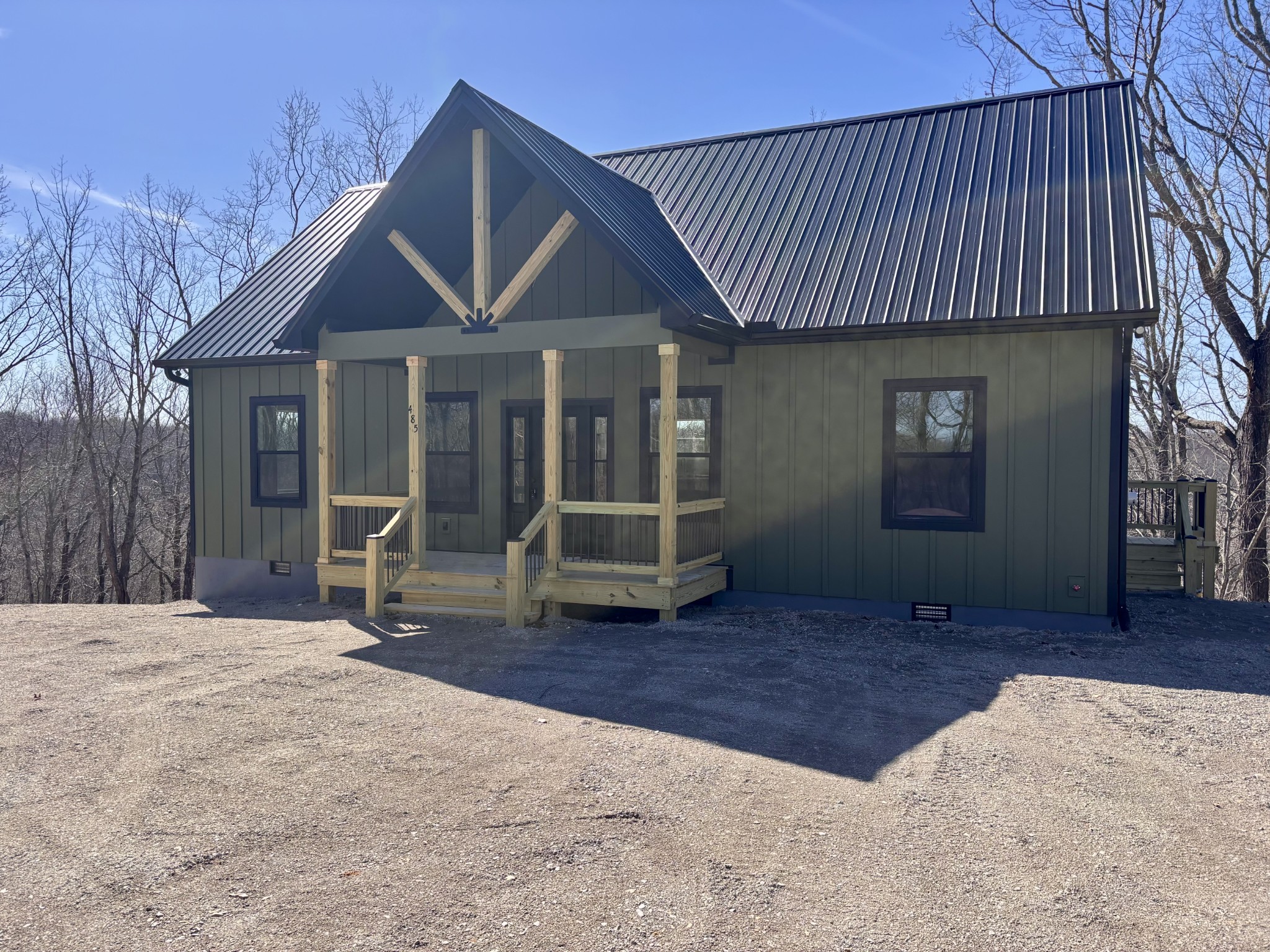 485 Baron Bluff Road Smithville, TN 37166 - Photo 2 of 28 a front view of a house with a yard