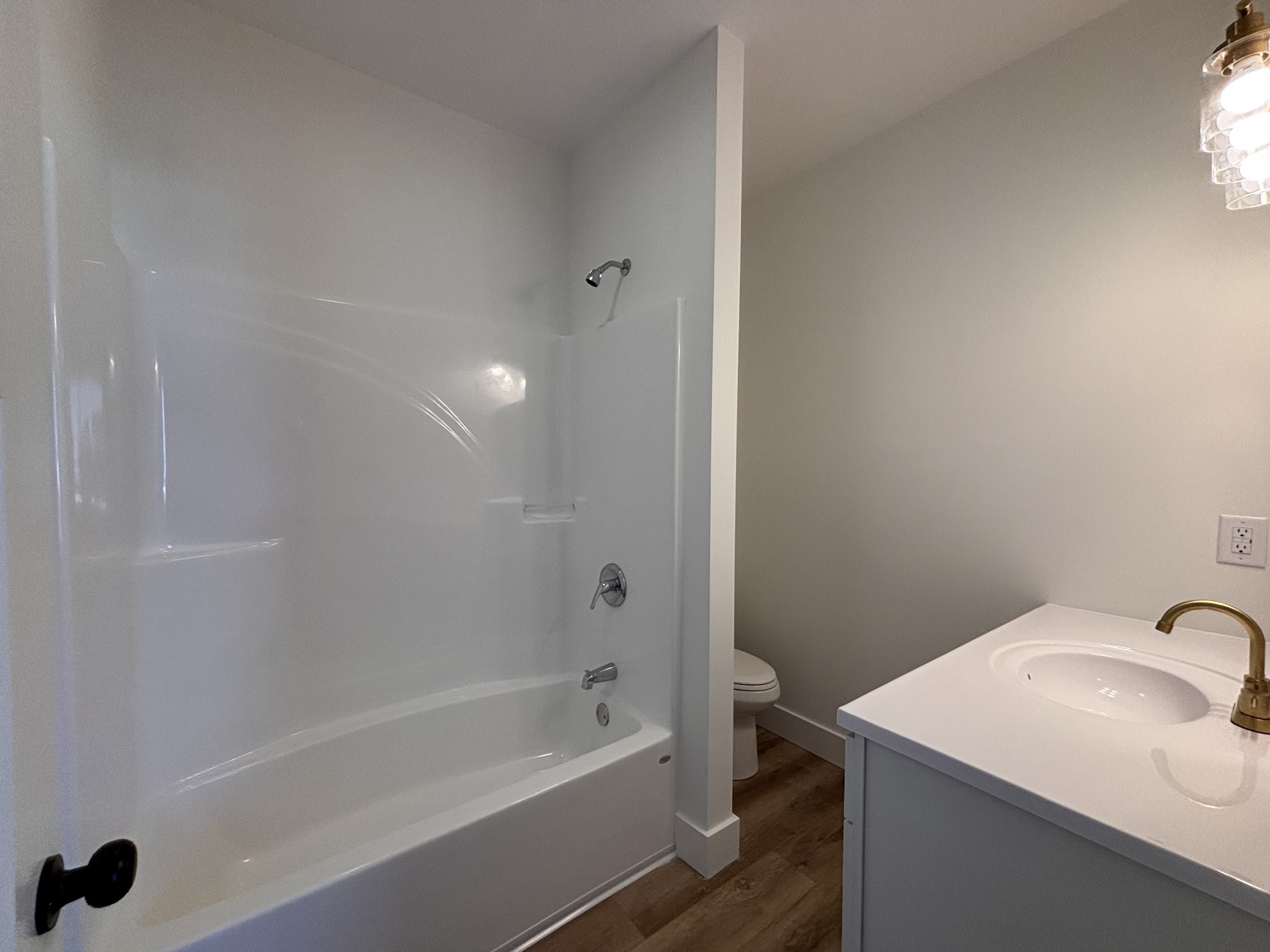485 Baron Bluff Road Smithville, TN 37166 - Photo 25 of 28 a bathroom with a sink and a bathtub