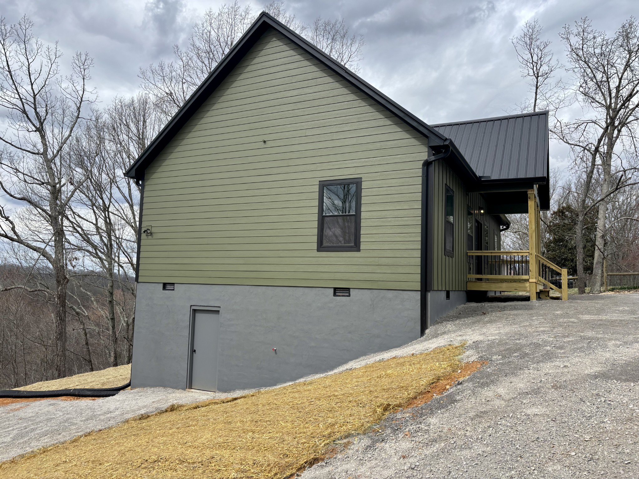 485 Baron Bluff Road Smithville, TN 37166 - Photo 28 of 28 a view of a house with a backyard