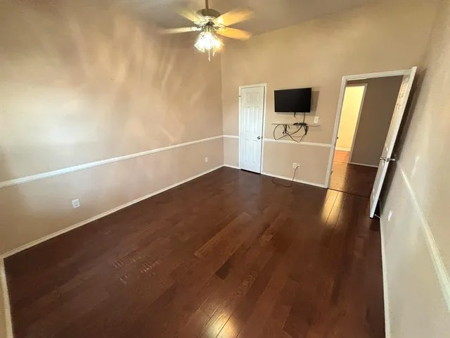 a view of a livingroom with a flat screen tv