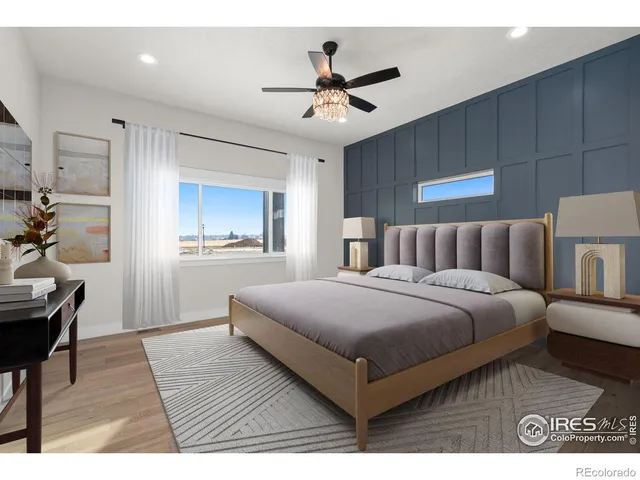 a view of an empty room with a ceiling fan