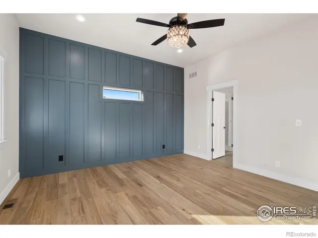 a bathroom with a double vanity sink and mirror